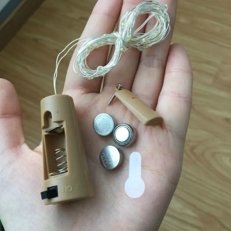 Lumières LED pour bouchons de bouteille avec boîtier à piles
