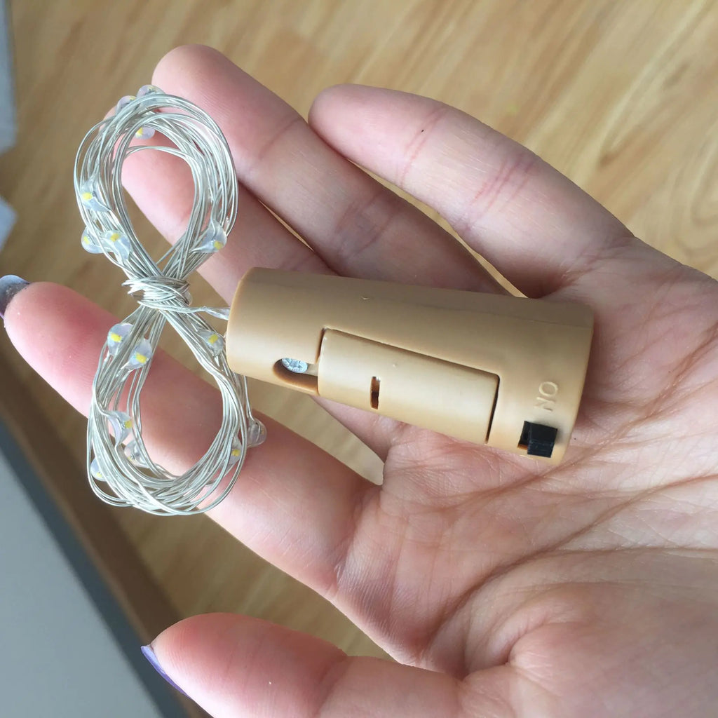 Lumières LED pour bouchons de bouteille avec boîtier à piles